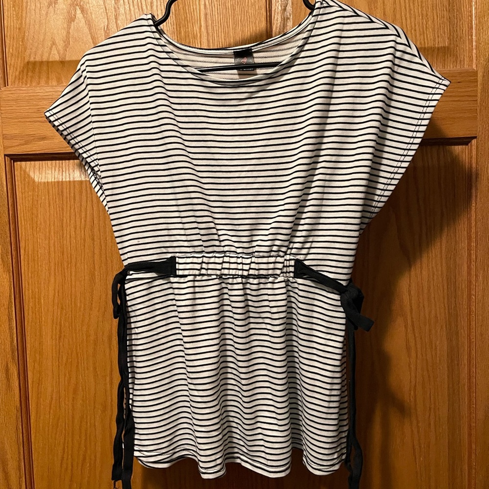 Women’s boutique top. White with black stripes and black ties on the sides